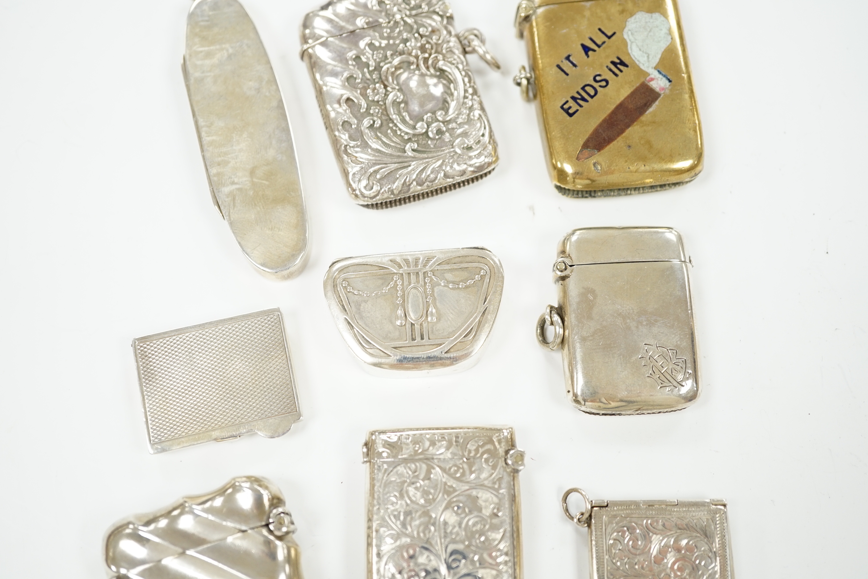 Five assorted silver vesta cases, including Victorian oval by Sampson Mordan, 72mm, a brass and enamel 'It all Ends In' vesta case, two pill boxes and a silver 'envelope' stamp case.